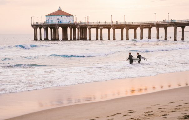 Manhattan Beach pier with two swimmer